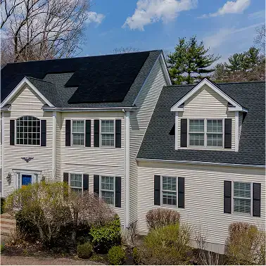 Golden Group Roofing & Solar team and work vehicle in Needham